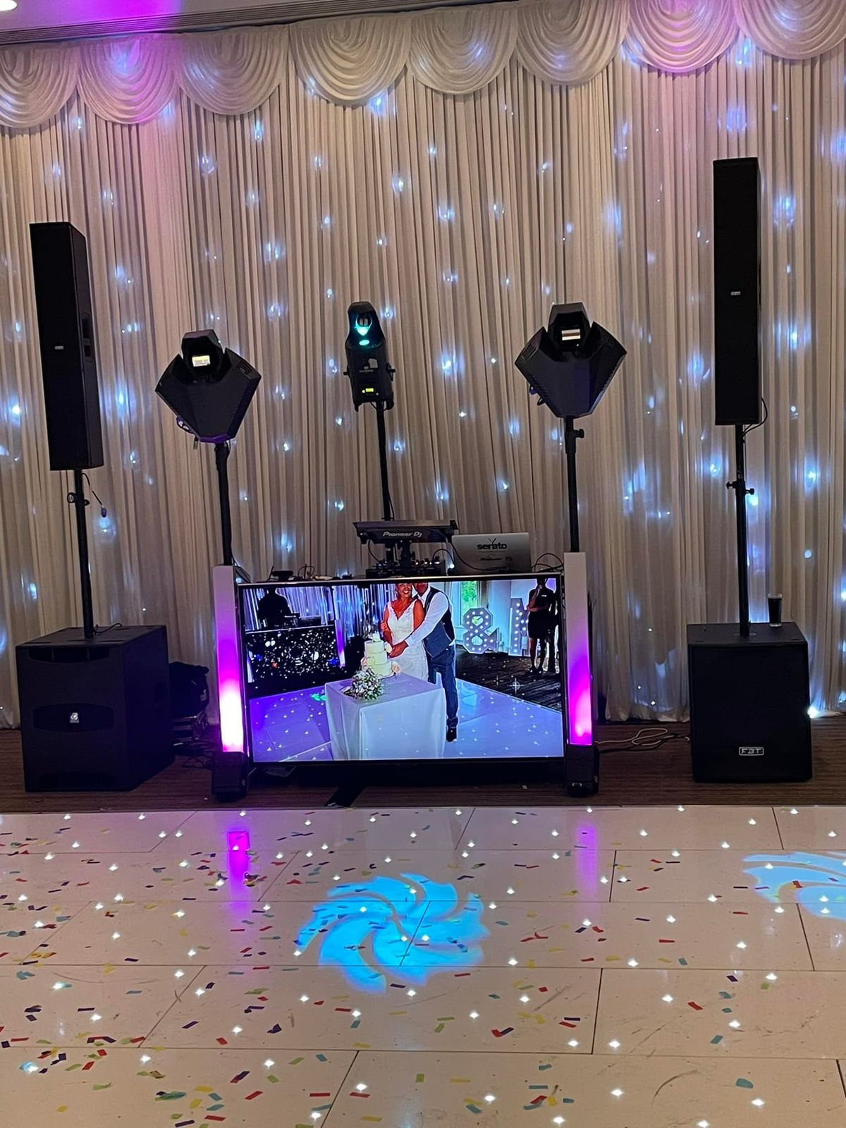 Dyson Events DJ booth with sparkle backdrop and starlight LED dance floor